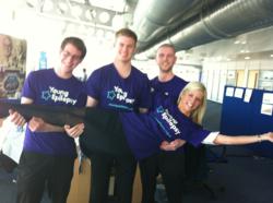 Hendy Kia staff in purple